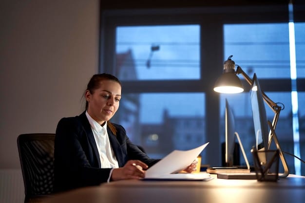 An individual in a business suit sitting at a desk, reviewing legal documents under the soft light of a desk lamp, representing the everyday legal considerations of individuals and businesses.