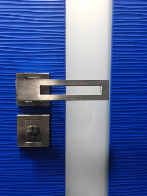A close-up of a reinforced door frame with a high-security deadbolt lock installed, showcasing the sturdiness and effectiveness of the door's security features.