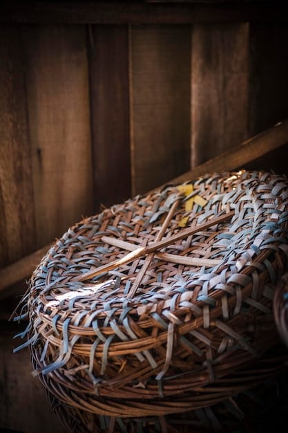 A close-up shot of a Native American artisan weaving a traditional basket with intricate patterns.