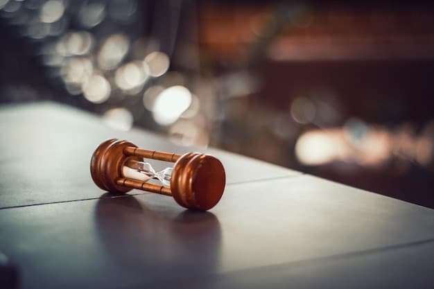 A close-up shot of a gavel striking a sound block in a courtroom setting. The background is slightly blurred, showing legal books and documents, emphasizing the rule of law and regulatory enforcement.