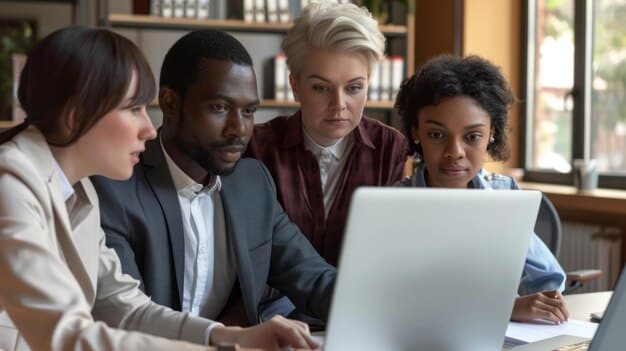 A diverse group of people attending a data privacy workshop, with laptops and presentation slides visible, showcasing the importance of education and awareness.